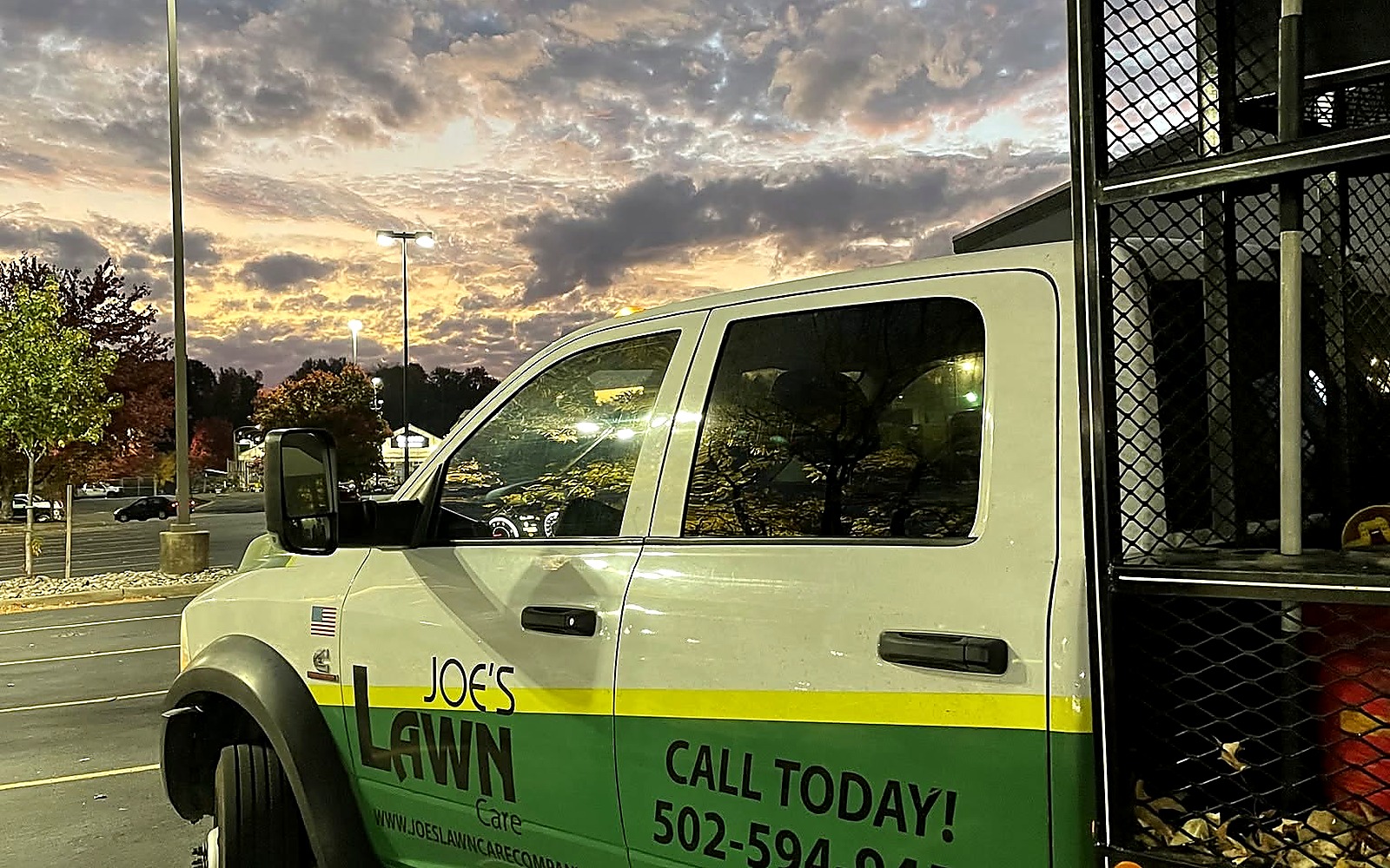 Joe's Lawn Care truck at work in Louisville