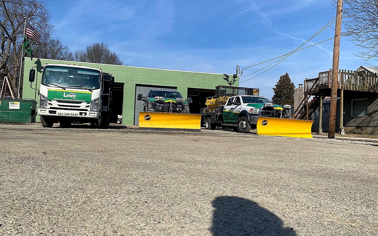 Joe's Lawn Care snow plow trucks